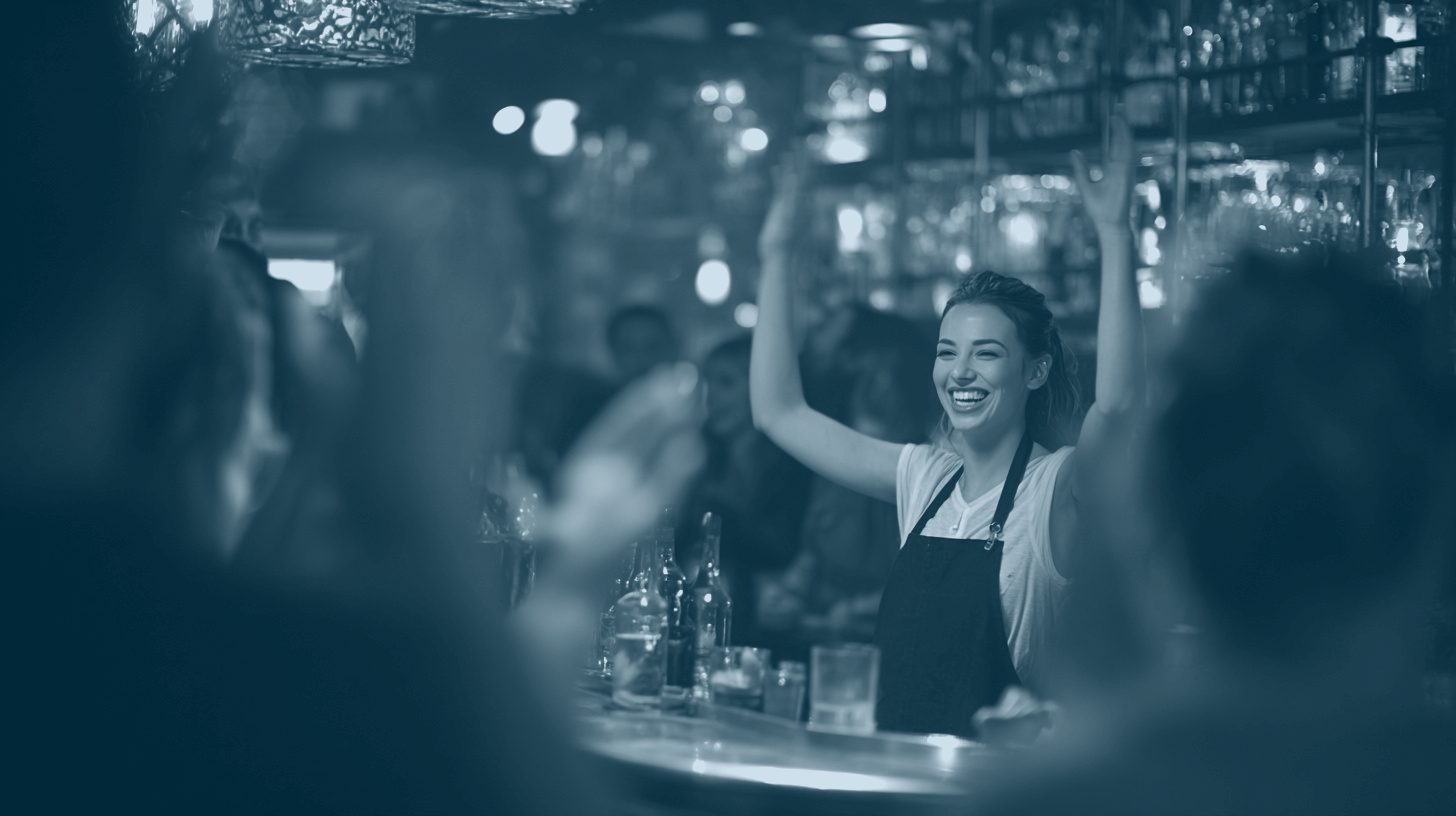 Bartender celebrating with a crowd